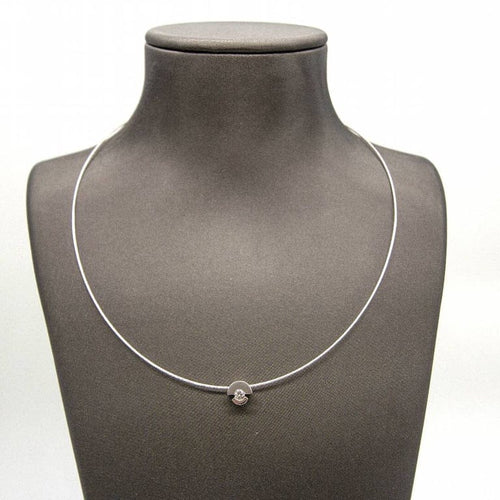Collier Collier solitaire - Pendentif en acier tressé et diamant 0,12 ct 58 Facettes D363928SO