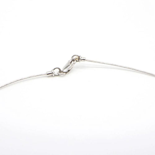 Collier Collier solitaire - Pendentif en acier tressé et diamant 0,12 ct 58 Facettes D363928SO
