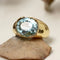 Bague 53 Bague jonc en or jaune 18 carats avec topaze bleue 58 Facettes 24-301
