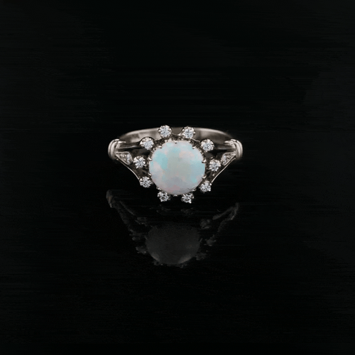 Bague 53 Bague opale ronde et diamants en or blanc 18 carats 58 Facettes 24-121