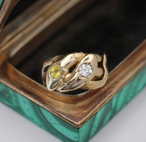 Bague 62 Bague ancienne serpent en or jaune 18 carats, diamant et saphir jaune 58 Facettes 23-291