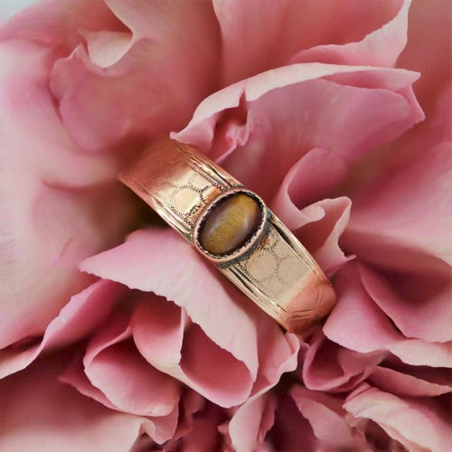 Bague 50 Bague jonc ancienne en or rose 18 carats et œil de tigre 58 Facettes 19-091B