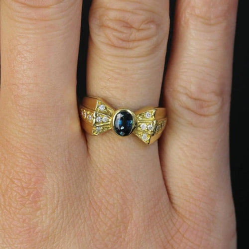 Bague 53 Bague nœud en or jaune 18 carats saphir et diamants 58 Facettes 21-222B