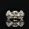 Bague 52 Bague nœud Art déco en or blanc 18 carats et diamants 58 Facettes 22-460