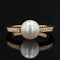 Bague 57 Bague en or jaune 18 carats avec perle et diamants 58 Facettes 22-298