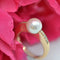 Bague 57 Bague en or jaune 18 carats avec perle et diamants 58 Facettes 22-298