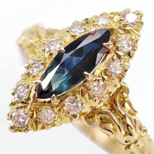 Bague 54 Bague marquise en or jaune 18 carats avec saphir navette et diamants 58 Facettes 21-831