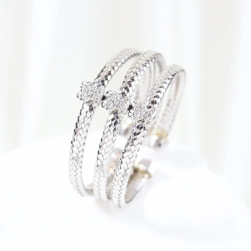 Bague 66 TOUS - Bague triple tressée en or blanc 18 carats et diamants 58 Facettes J000002214