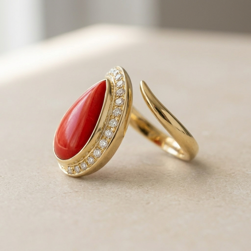 Bague 55 Bague en or jaune 18 carats, corail et diamants 58 Facettes 1853