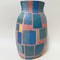 https://cdn.shopify.com/s/files/1/0943/8576/6747/files/vase-design-allemand-1970.jpg?v=1769531535