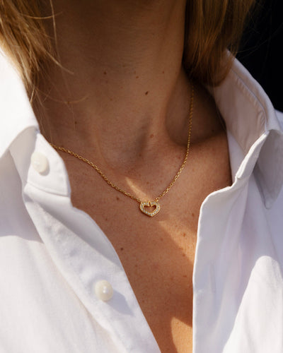 Collier Cartier - Collier Cœur n° 132 en or jaune et diamants 58 Facettes