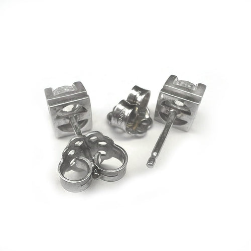 Bague Boucles d’oreilles solitaires - Diamants taille brillant en or blanc 18 kt 58 Facettes UKD364478GM