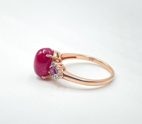 Bague 55 Bague en or rose avec rubis, grenats et diamants 58 Facettes