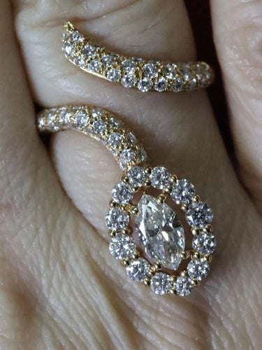 Bague 54 Bague serpent marquise en or jaune et diamants 58 Facettes P154