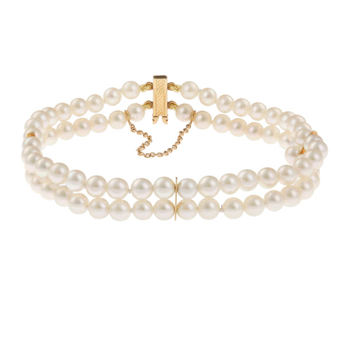 https://cdn.shopify.com/s/files/1/0647/1470/3075/files/Bracelet_de_Luxe_-_Bracelet_de_Perles_2_Rangs_Or_Jaune_-_Joaillerie_Paris_-_Les_Pierres_de_Julie_1.jpg?v=1771945034