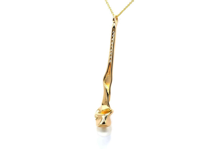 Pendentif Pendentif années 70 en or jaune 18 carats, perle et diamants 58 Facettes 23449
