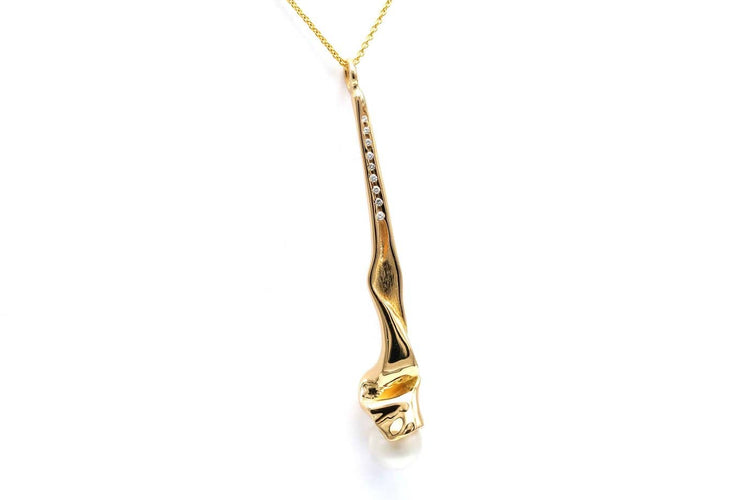 Pendentif Pendentif années 70 en or jaune 18 carats, perle et diamants 58 Facettes 23449