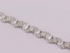 Bracelet Bracelet tennis en or blanc et diamants taille émeraude et poire 58 Facettes 3335