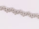 Bracelet Bracelet tennis en or blanc et diamants taille émeraude et poire 58 Facettes 3335