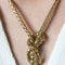 collier-en-or-Elo-orvet-et-ses-pompons-d-or-p-image-168888-grande.jpg