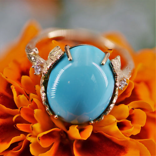 https://www.bijouxbaume.com/upload/image/bague-turquoise-diamants-monture-feuillagee-p-image-122553-grande.jpg