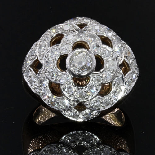 https://www.bijouxbaume.com/upload/image/bague-boule-ajouree-d-un-decor-de-fleur-et-diamants-p-image-114961-grande.jpg