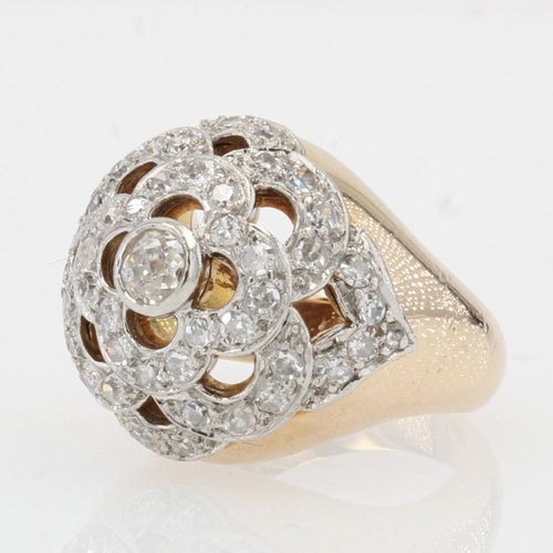 https://www.bijouxbaume.com/upload/image/bague-boule-ajouree-d-un-decor-de-fleur-et-diamants-p-image-114970-grande.jpg
