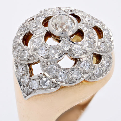 https://www.bijouxbaume.com/upload/image/bague-boule-ajouree-d-un-decor-de-fleur-et-diamants-p-image-139580-grande.jpg
