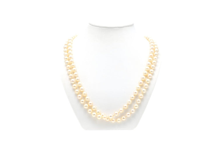 Collier Collier années 70 en or blanc 18 carats, émeraude et perles 58 Facettes B677