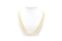 Collier Collier années 70 en or blanc 18 carats, émeraude et perles 58 Facettes B677