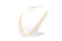 Collier Collier années 70 en or blanc 18 carats, émeraude et perles 58 Facettes B677