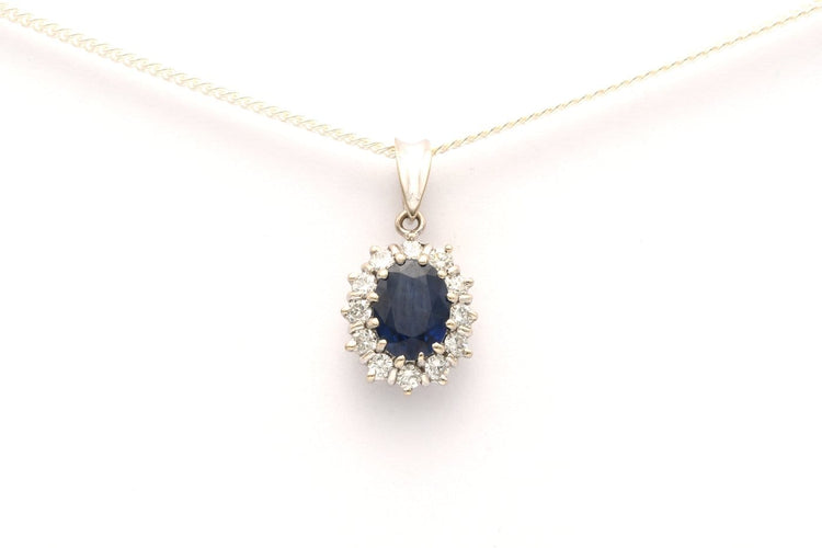 Pendentif Pendentif contemporain en or blanc 18 carats avec saphir et diamants 58 Facettes 21989