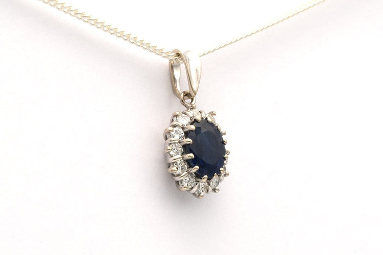 Pendentif Pendentif contemporain en or blanc 18 carats avec saphir et diamants 58 Facettes 21989