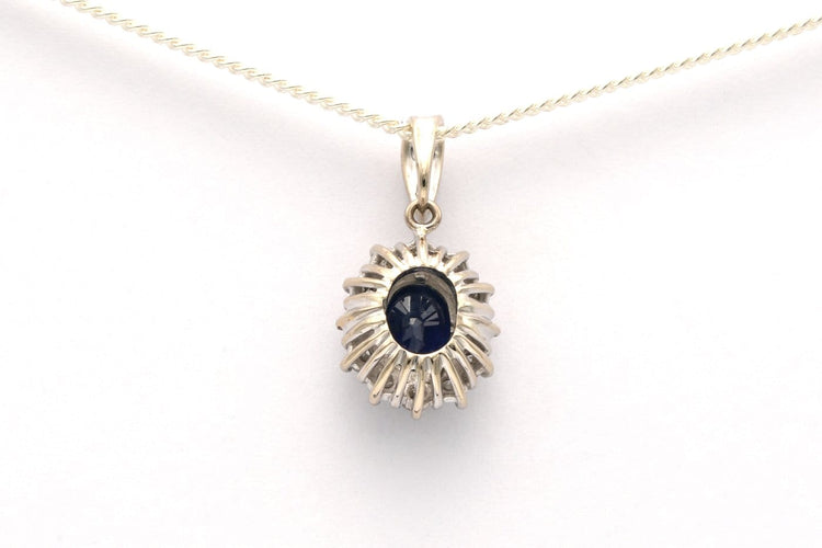Pendentif Pendentif contemporain en or blanc 18 carats avec saphir et diamants 58 Facettes 21989