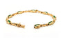 Bracelet Bracelet contemporain en or jaune 18 carats serti d’émeraudes et diamants 58 Facettes B727