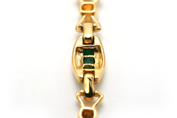 Bracelet Bracelet contemporain en or jaune 18 carats serti d’émeraudes et diamants 58 Facettes B727