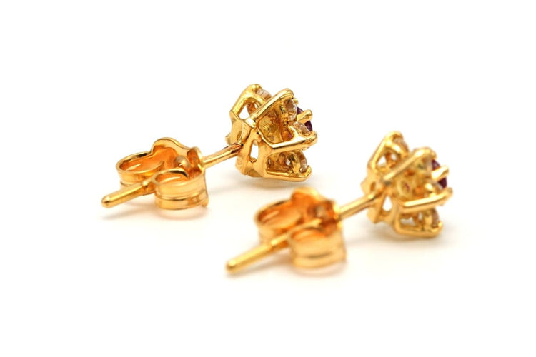 Boucles d'oreilles Boucles d'oreilles contemporaines en or jaune 18 carats, rubis et diamants 58 Facettes B762
