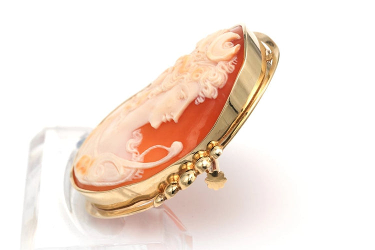 Broche Broche Art déco en or jaune 18 carats sertie d’un camée 58 Facettes B363