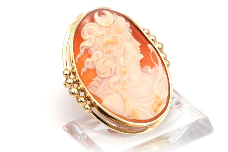 Broche Broche Art déco en or jaune 18 carats sertie d’un camée 58 Facettes B363