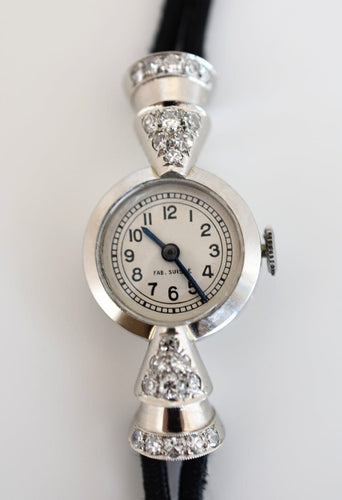Montre Montre joaillière Art déco - Montre dame en platine 950 et diamants 58 Facettes MNS-100