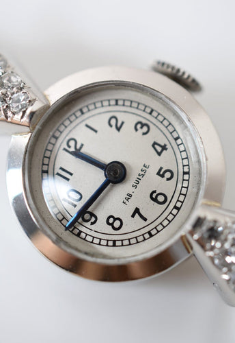 Montre Montre joaillière Art déco - Montre dame en platine 950 et diamants 58 Facettes MNS-100