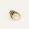 Bague 48 Bague jarretière en or jaune 18K avec émeraude 2,04 ct et diamants 58 Facettes BIA1305