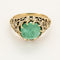 Bague 48 Bague jarretière en or jaune 18K avec émeraude 2,04 ct et diamants 58 Facettes BIA1305
