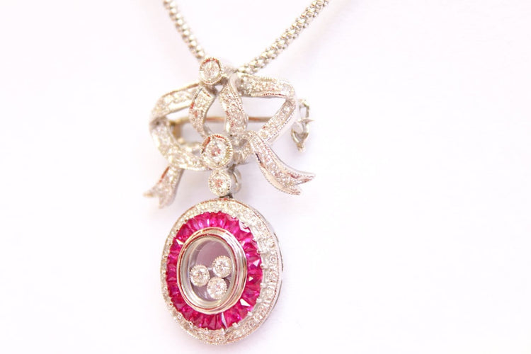 Collier Collier avec pendentif-broche nœud pavé de diamants et rubis 58 Facettes MT240099