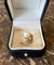 https://cdn.shopify.com/s/files/1/0647/1470/3075/files/Bague_Cocktail_-_Bague_Andrew_Grima_Perle_Diamants_Or_Jaune_-_Bijouterie_Paris_-_Les_Pierres_de_Julie_5_4b8747fc-8ffa-4cc8-b6a1-5eeb141b83b2.jpg?v=1781282267
