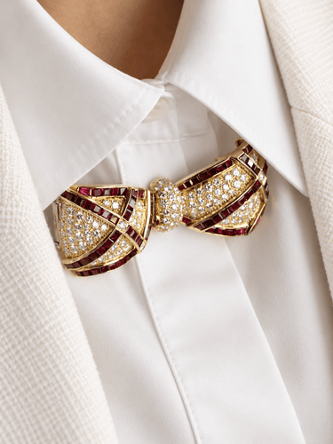 Broche Broche noeud or jaune rubis diamants 58 Facettes 1242.3