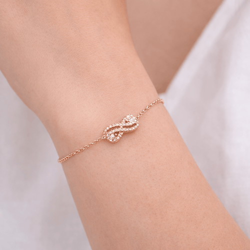 Bracelet Guérin - Bracelet en or rose 18 carats et diamants 58 Facettes Bracelet signé Guérin en or rose 18K et diamants