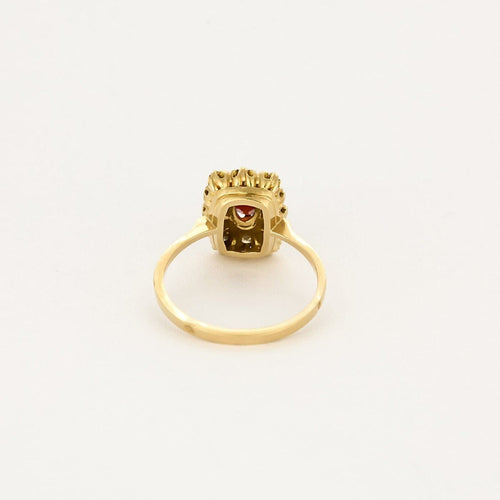 Bague 54 Bague marguerite en or jaune 18K grenat et diamants 58 Facettes PAL32243