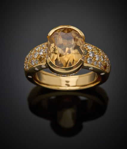 Bague 61 Bague en or jaune sertie d’un zircon avec diamants et saphirs 58 Facettes 227341