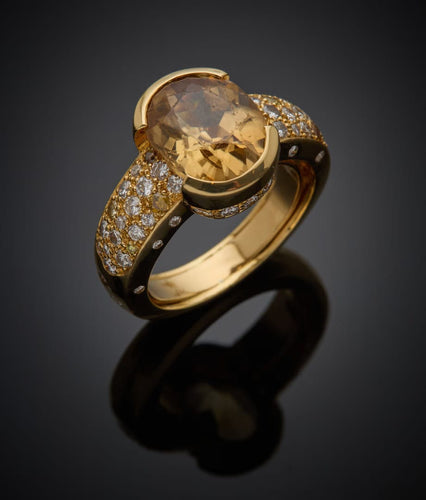 Bague 61 Bague en or jaune sertie d’un zircon avec diamants et saphirs 58 Facettes 227341